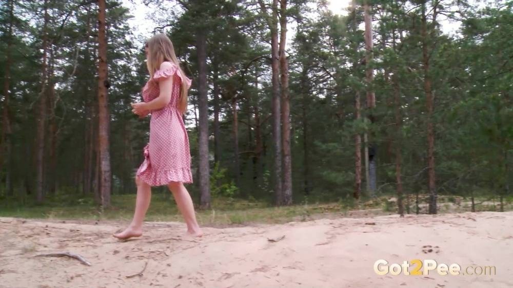 Distressed girl Nastya squats for an urgent piss on a sandbank - #4