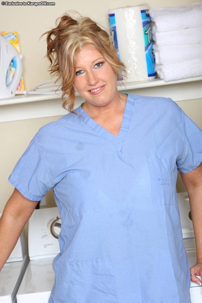 Chubby mature nurse with big saggy jugs undressing and spreading her cunt - #6