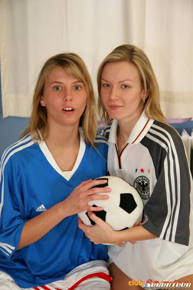 Cute teen girls go lesbian after trying on soccer outfits on a bed - #15