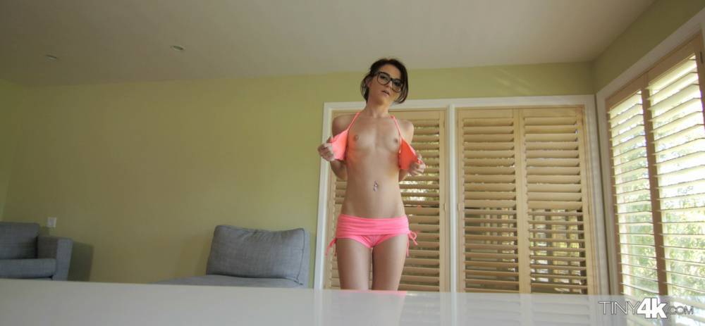 Glasses clad Emma Stoned hikes her legs high to get her horny pussy banged - #11