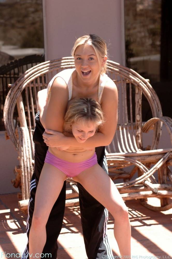 Cutie in pink panties Fiona Luv fights with busty Alison outdoors - #10