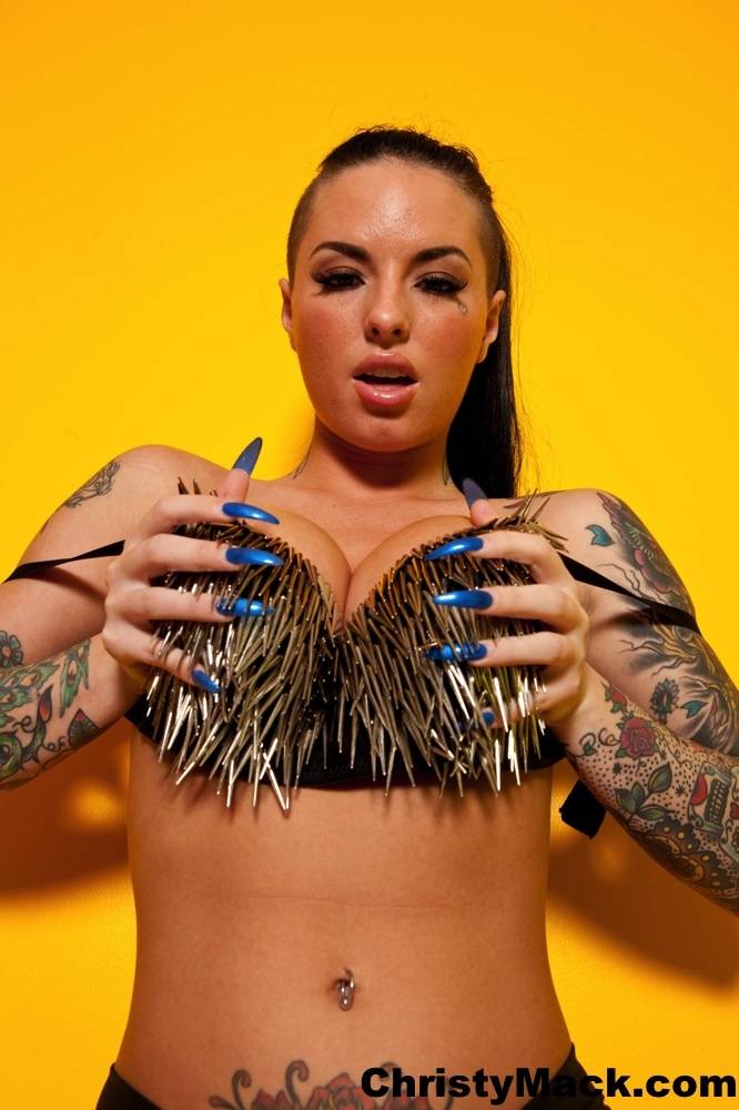 Tattooed hot pornstar Christy Mack fondles her round tits and spreads pussy - #1