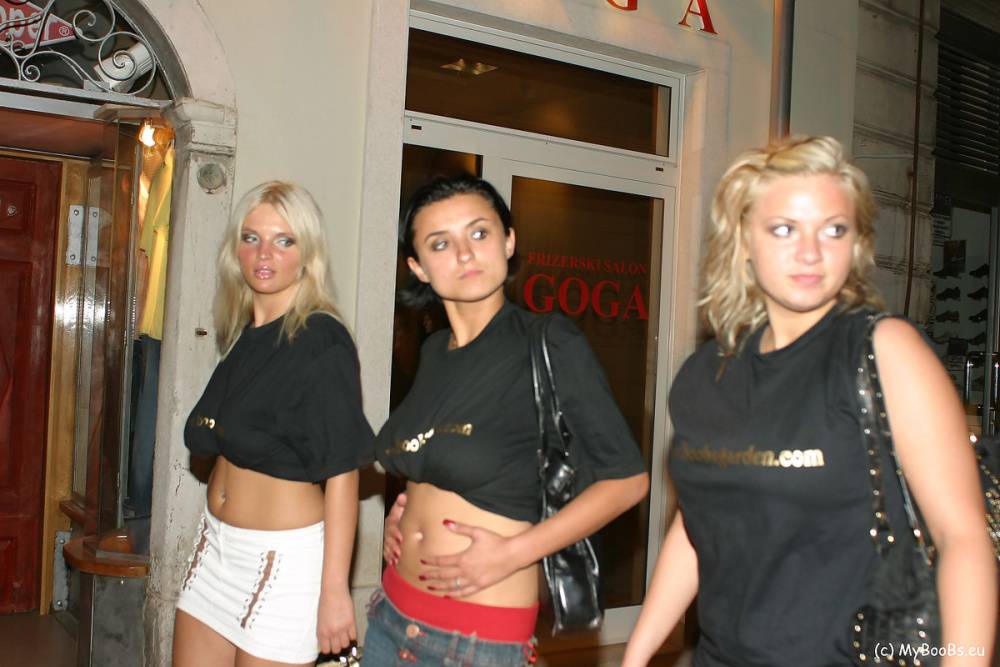 Three girls flash their natural tits while walking a city street at night - #11