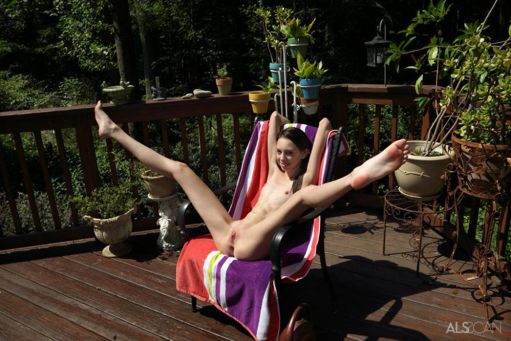 Skinny teen girl Aria Haze takes off her bikini and pegs her twat on patio | Photo: 346513