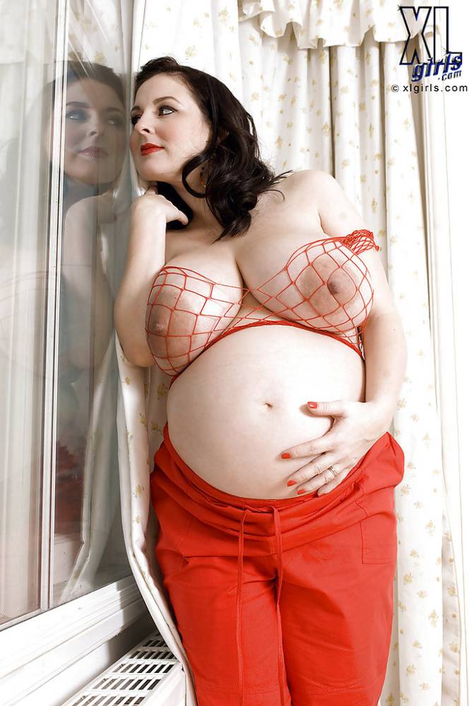 Brunette preggo with fat tits Lorna Morgan posing in fishnet bra and black panties - #7