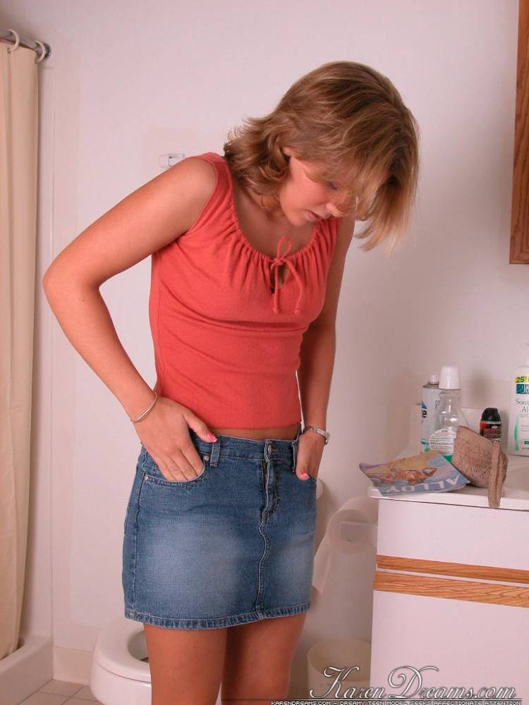 Amateur girl Karen hikes her denim skirt in the bathroom to expose her panties - #4