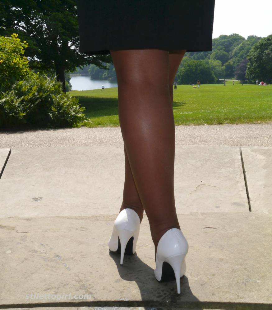 Solo girl Karen crosses her hose covered legs in white stiletto heels - #14