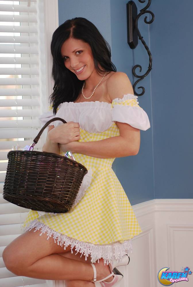 Cute brunette teen exposes her upskirt panties while carrying an Easter basket - #7