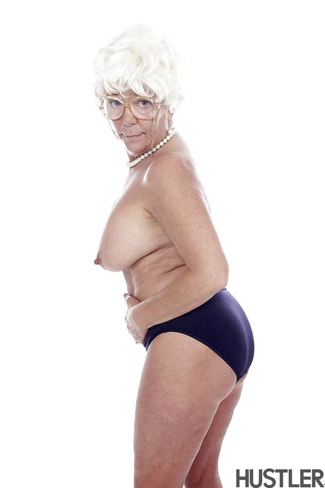 Granny pornstar Karen Summer modelling fully clothed before stripping naked - #10