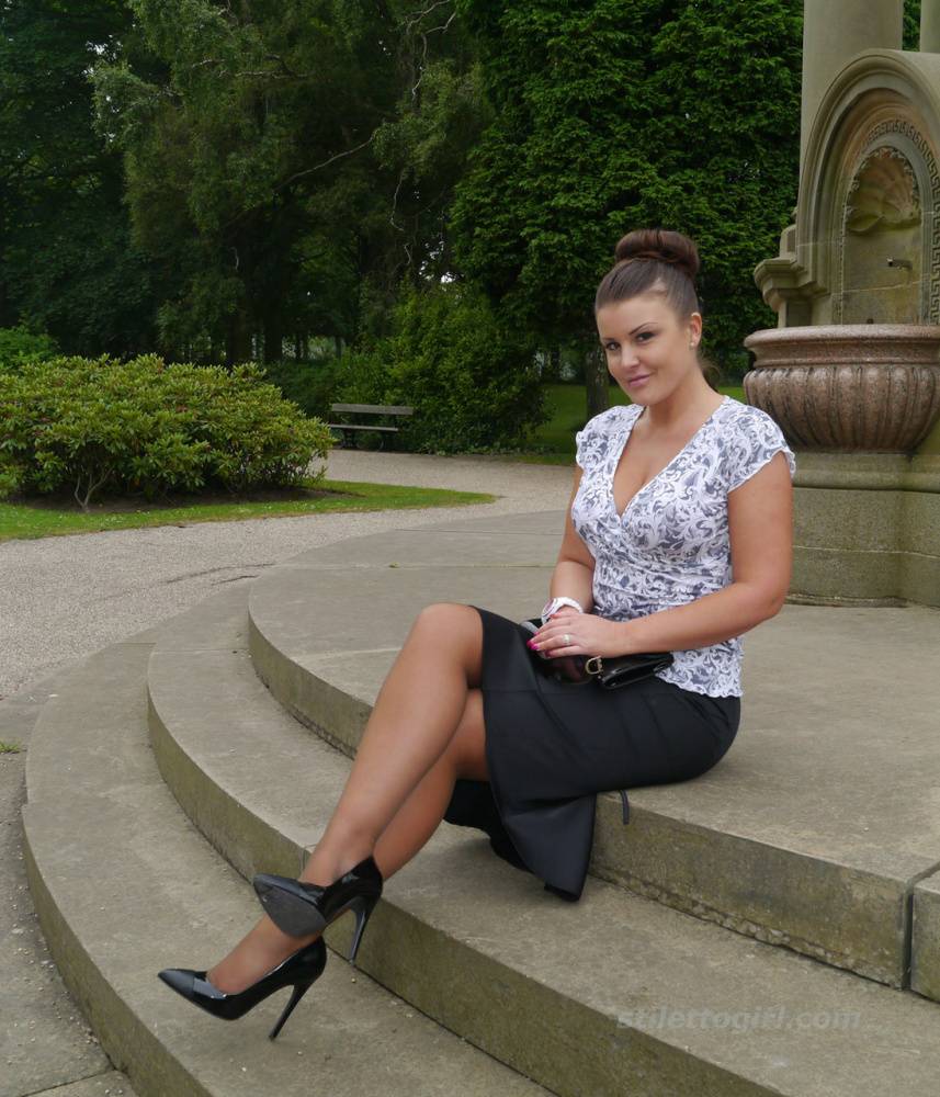 Clothed woman Karen displays her new stiletto heels at a park - #6