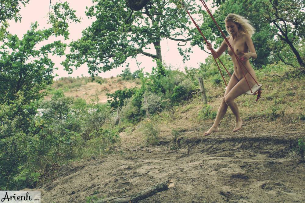 Natural blonde Arienh Autumn falls asleep on a beach while completely naked - #9
