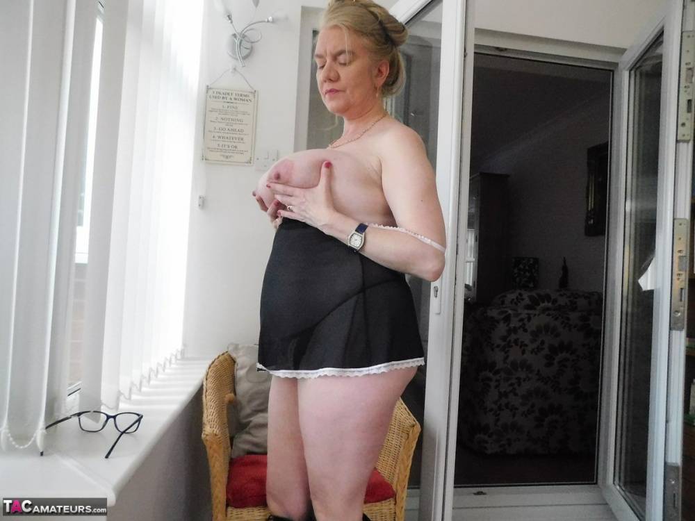 Old British woman Lily May frees her huge tits and twat from lingerie in boots - #16