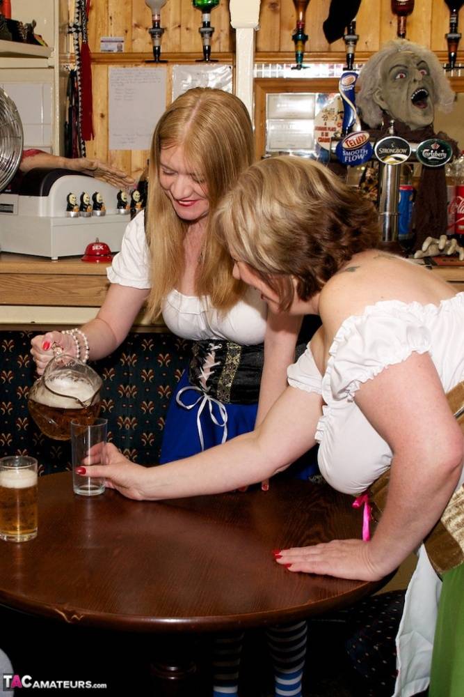 British amateur Lily May and a girlfriend serve pints and pussies in a pub | Photo: 408538