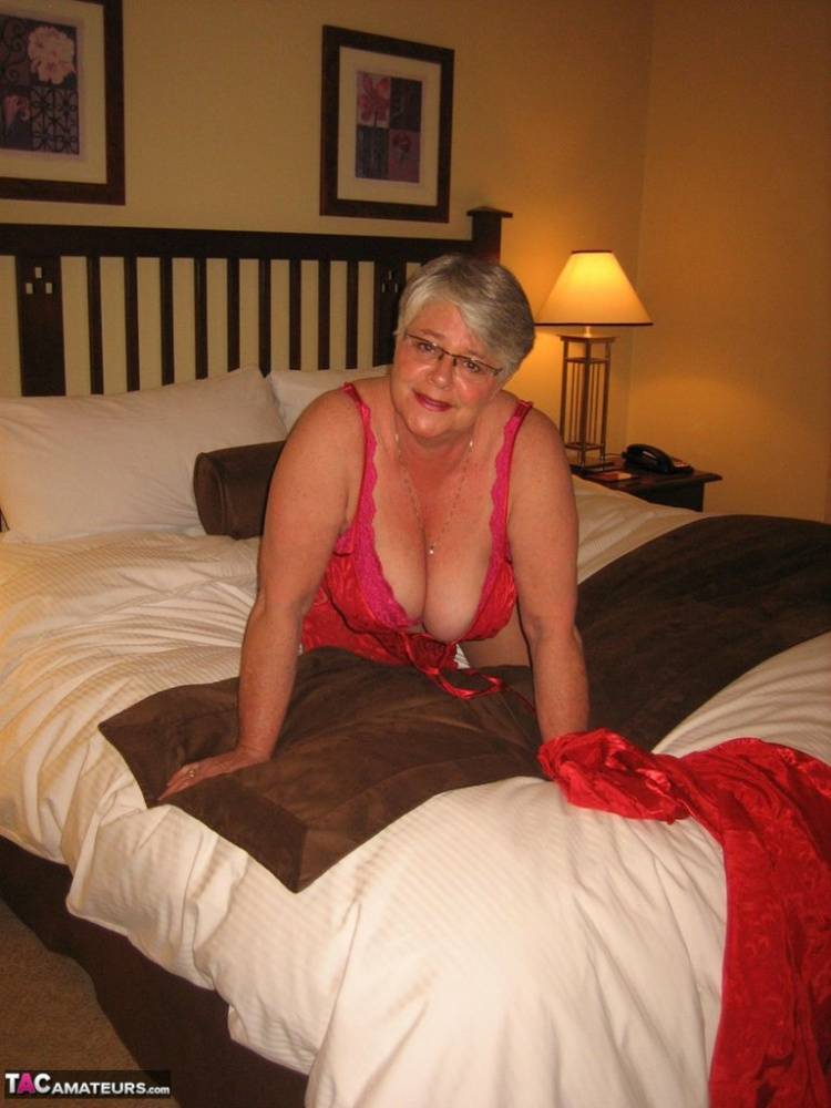 Fat granny Girdle Goddess whips out her big boobs on a bed in pantyhose - #15