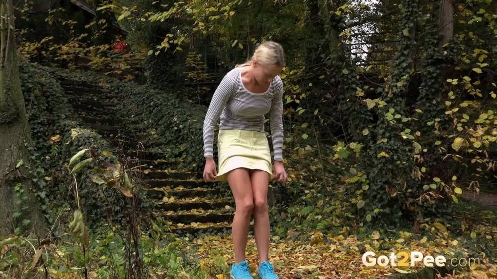 Cute blonde Victoria Pure hikes her skirt to take a pee along country lane | Photo: 526052