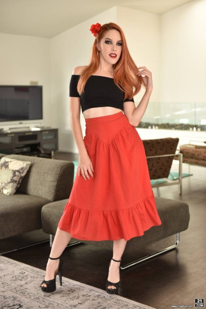 Redhead model Amarna Miller hikes her red skirt to slip out of black panties - #1