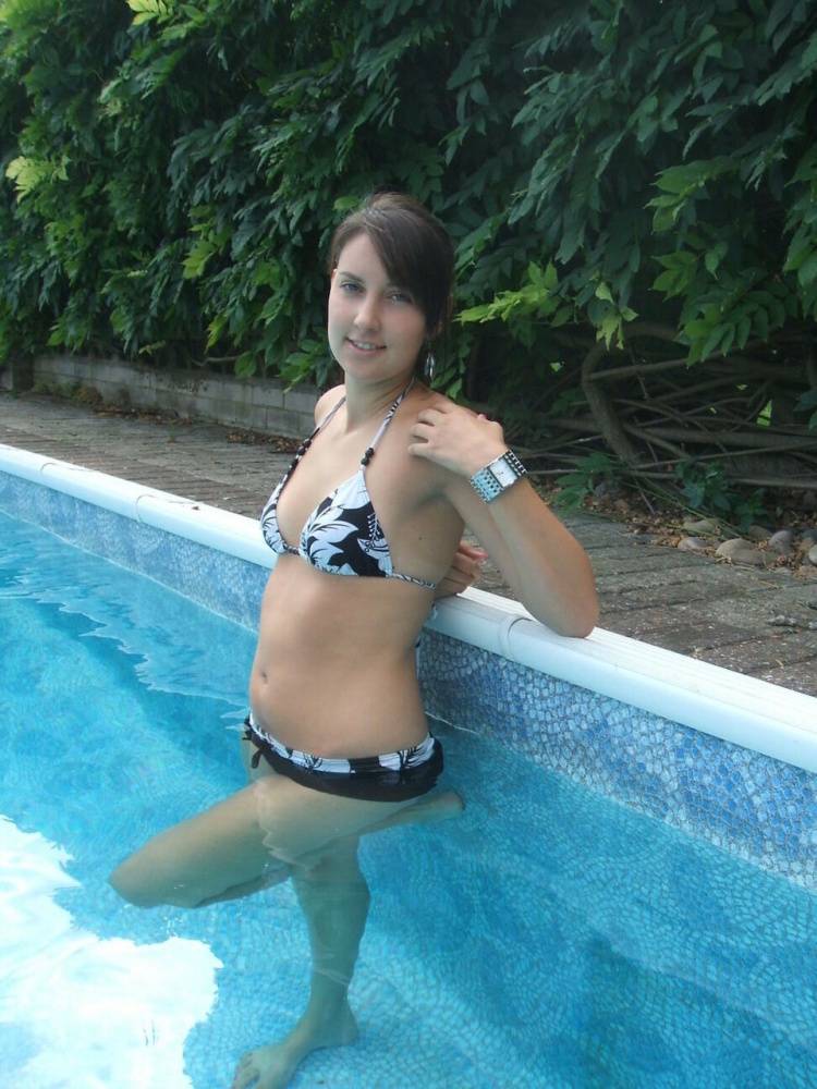 Amateur chick Roxy glances at her Morgan watch while in a swimming pool - #12
