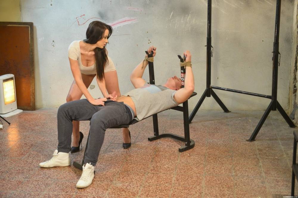 Female dominant ties a guy to weight lifting bench a jerks his cock - #7