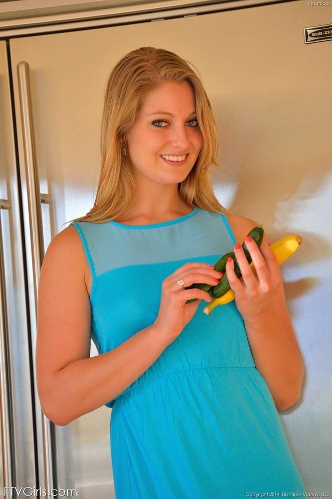 Sexy blonde hikes dress in kitchen to insert cukes in twat and ass - #14