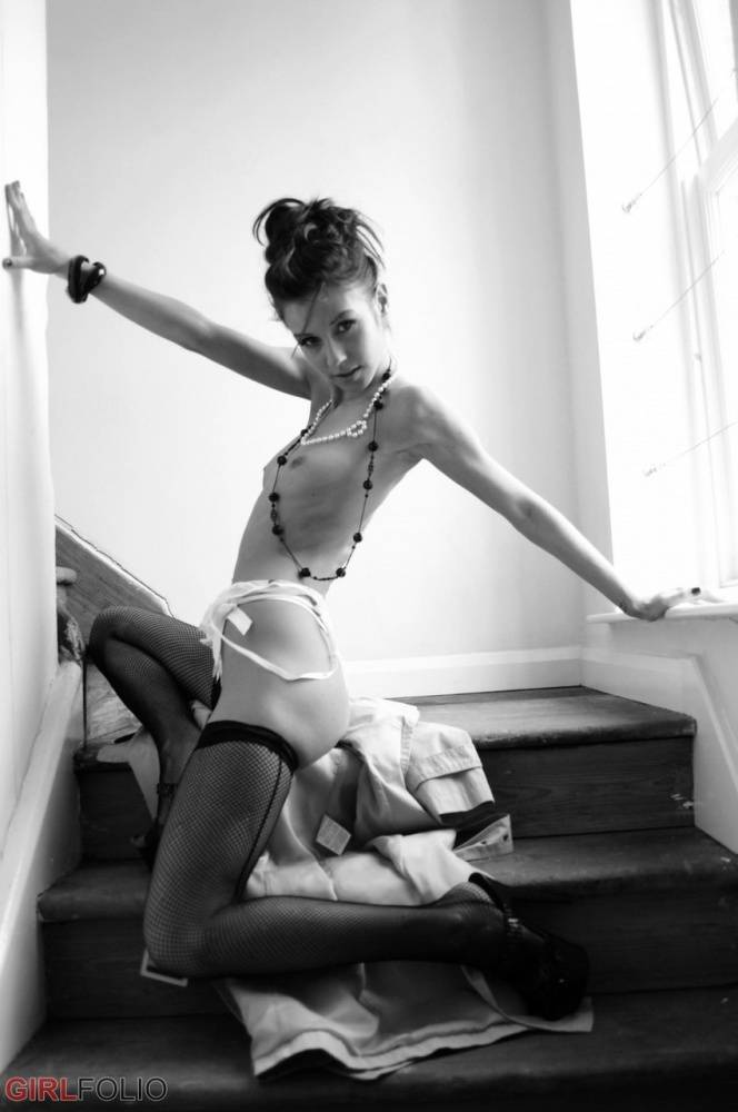 Slender solo model takes off her trenchcoat to model in lace undies and nylons - #9