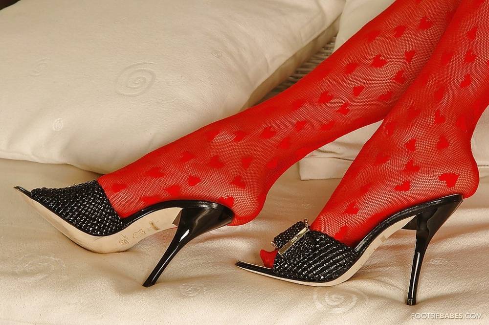 Jasmine Rouge showcasing her sexy feet in red stockings and high helled shoes - #3