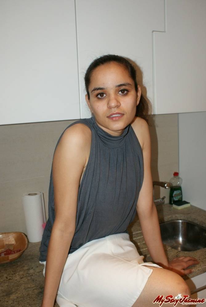 Jasmine in her kitchen exposing while cocking food - #10