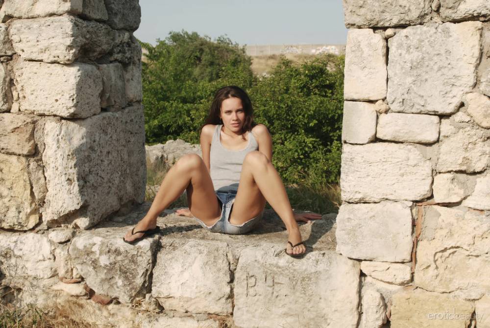 Nice girl Olya R gets totally naked amid the remnants of an ancient building - #16