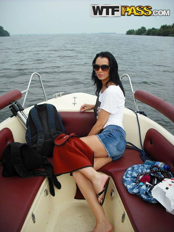 Brunette amateur shows her tits and pussy on a speed boat out on the water - #12