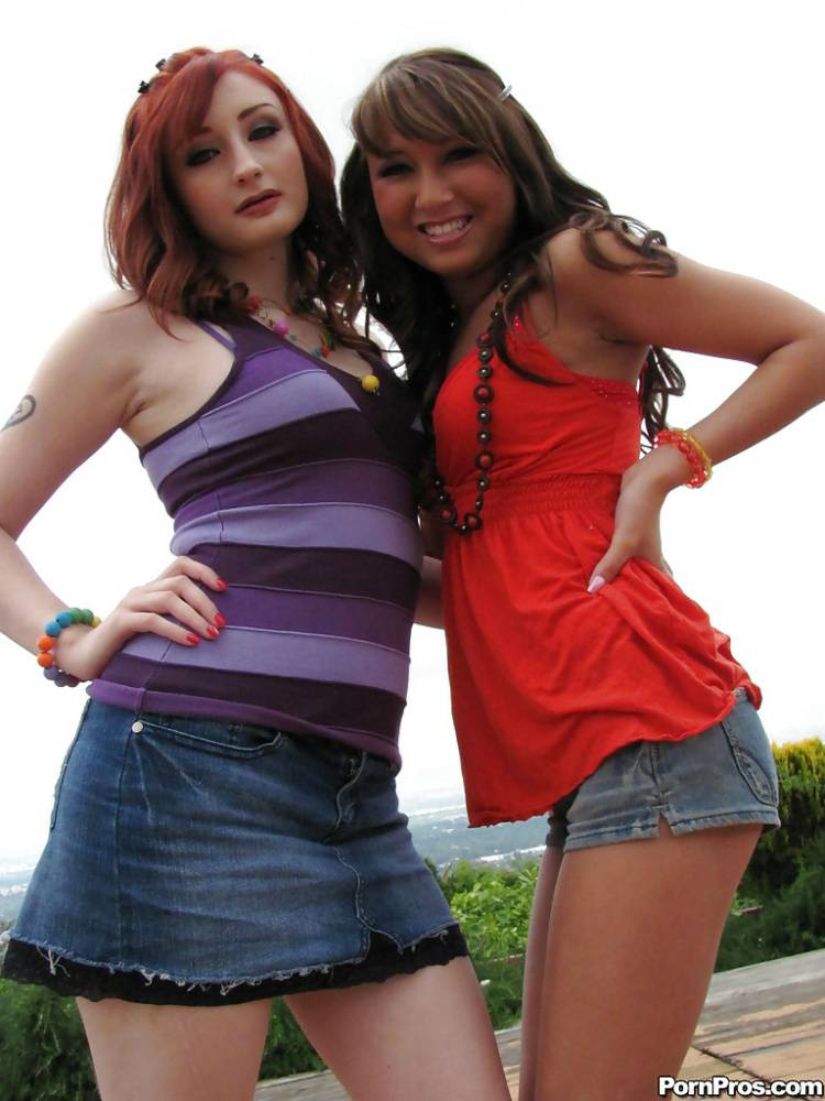 Hot lesbians in miniskirts Jesse Jordan and her friend spread pussy | Photo: 937532