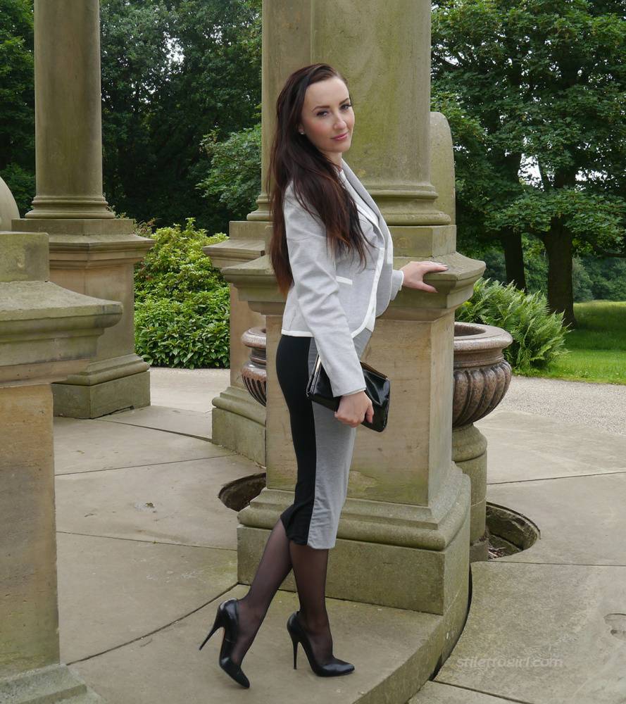 Clothed woman Sophia descends park steps in a long skirt and stiletto heels - #10