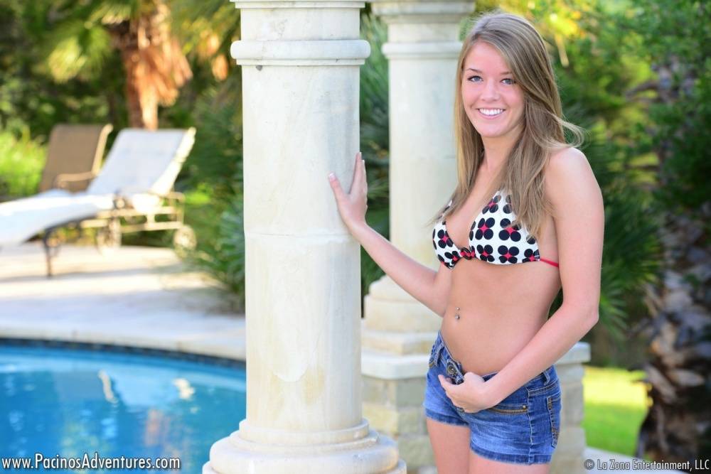 Cute teen Sophia Wood drops her shorts by the pool to toy with a vibrator | Photo: 952874