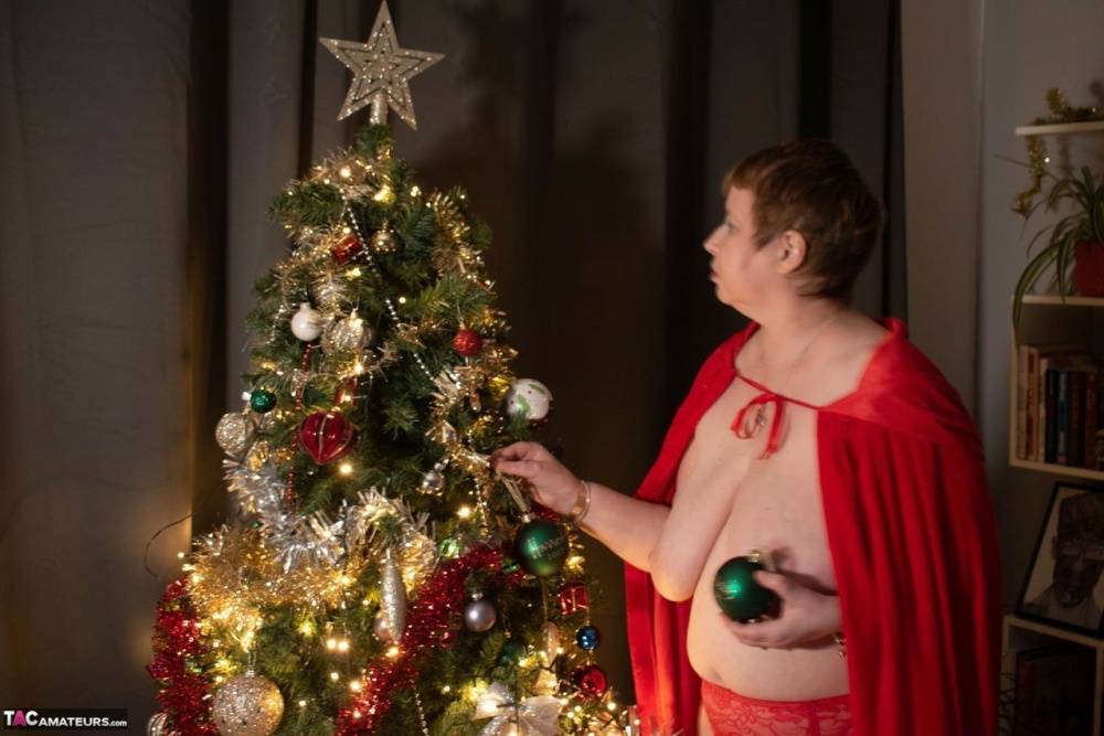 Mature BBW Posh Sophia hangs Christmas ornaments from her saggy tits - #10