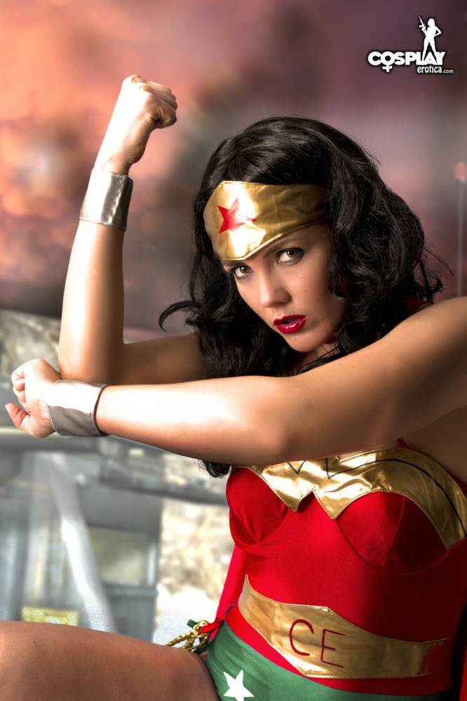 Beautiful brunette peels off her Wonder Woman outfit in a tempting manner - #2