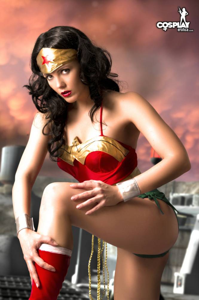 Beautiful brunette peels off her Wonder Woman outfit in a tempting manner - #7