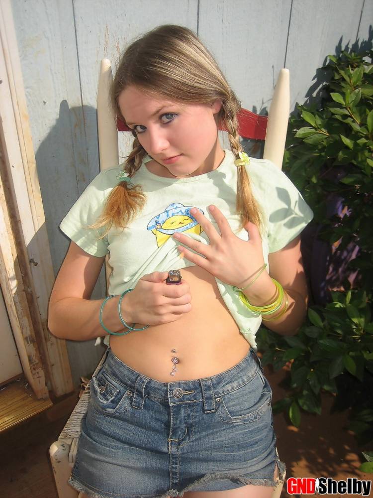 Cute teenage babe Shelby takes a smoke break and flashes us her perky tits - #11
