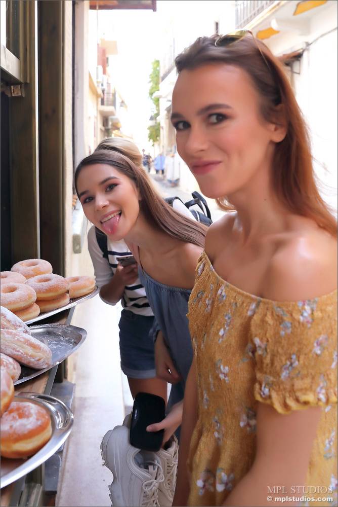 Leggy girls stumble across a donut stand while doing touristy things - #8