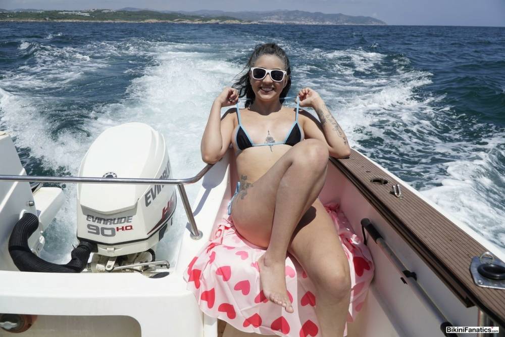 Kitty Angela frees her tits and pussy from a bikini while on a boat | Photo: 1036232