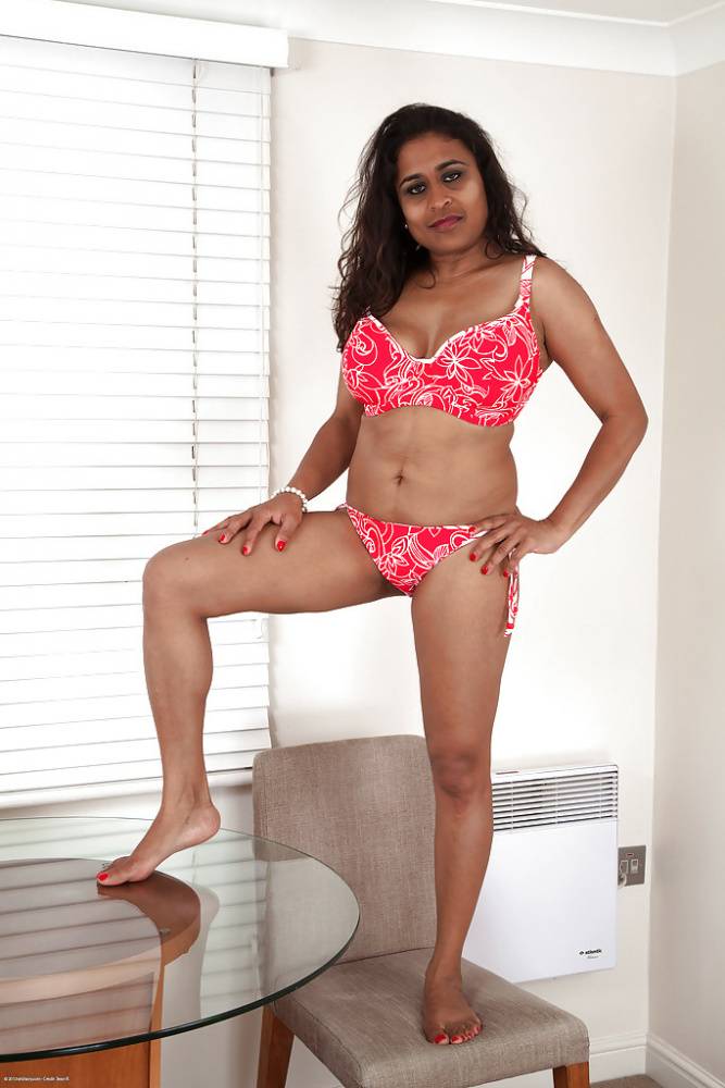 Sassy indian mature lassie in jeans shorts reveals her jugs and shaggy twat | Photo: 717820