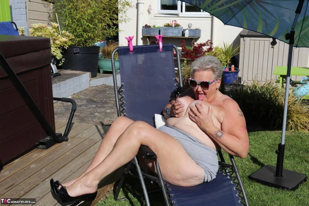 Fat nan Valgasmic Exposed licks a shoe while exposing herself in the backyard - #13