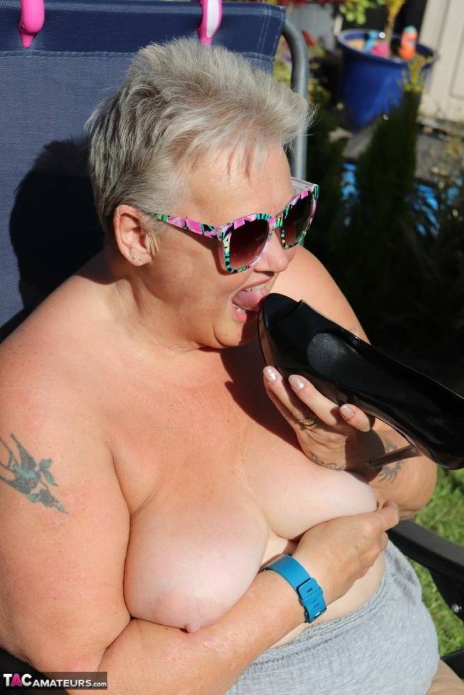 Fat nan Valgasmic Exposed licks a shoe while exposing herself in the backyard - #5