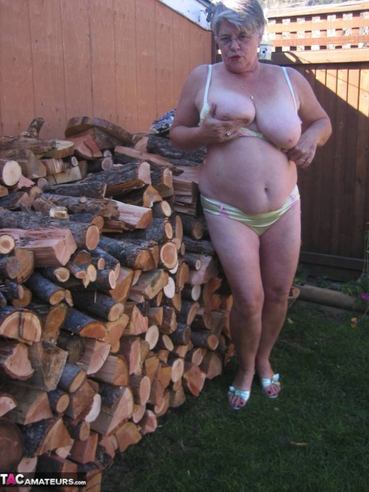 Brazen older granny strips off by the wood pile to show off BBW tits & big ass - #4