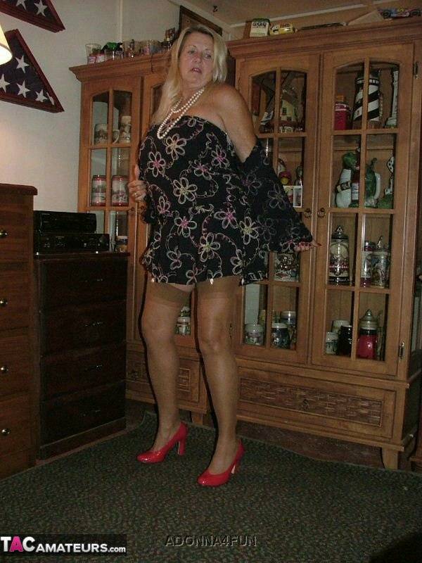 Fat grandmother with blonde hair exposes herself in tan nylons and garters - #14