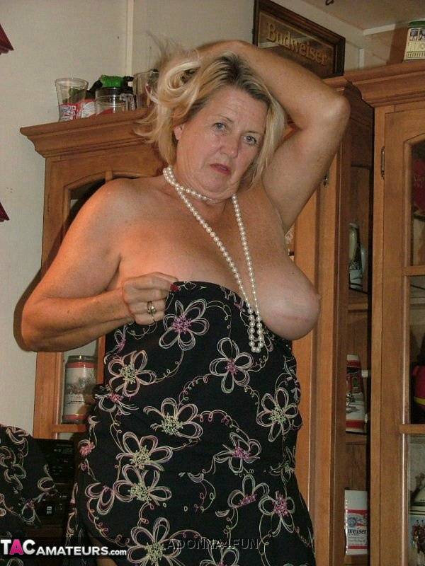 Fat grandmother with blonde hair exposes herself in tan nylons and garters - #12