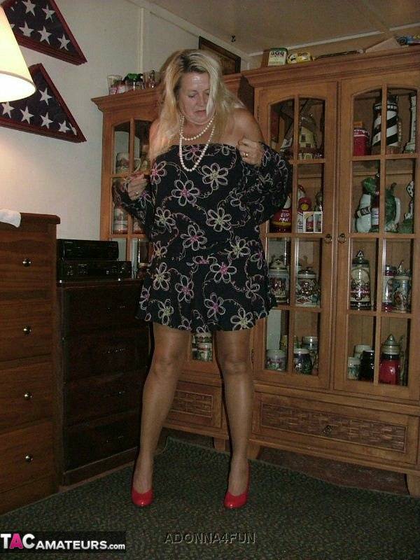 Fat grandmother with blonde hair exposes herself in tan nylons and garters - #11