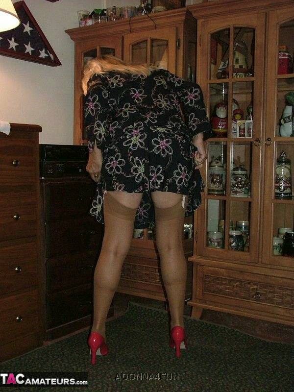 Fat grandmother with blonde hair exposes herself in tan nylons and garters - #10