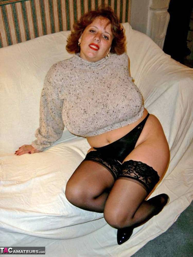 Busty mature woman Curvy Claire slides panties aside before dildoing on a bed - #10