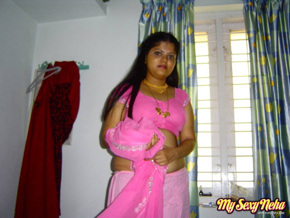 Plump Indian girl Neha gets totally naked on her bed in solo action - #6