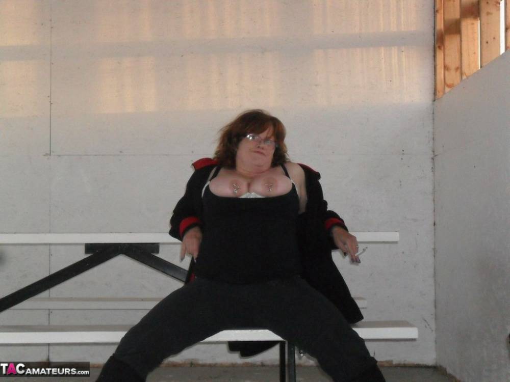 Overweight redhead Misha MILF exposes her tits & twat inside a building - #7