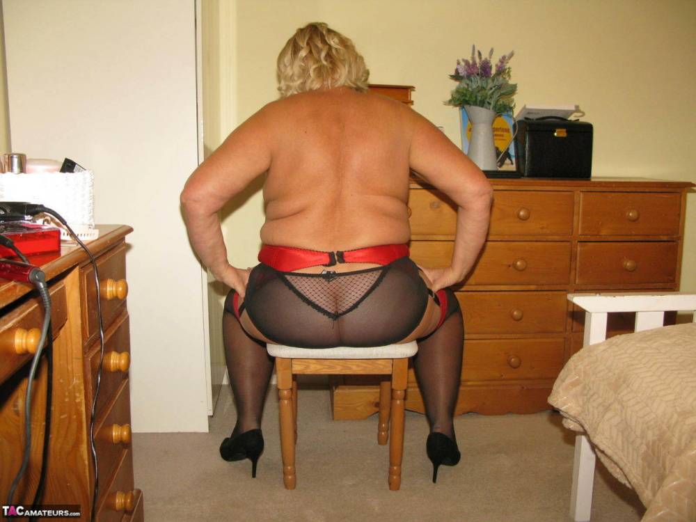 Older blonde fatty Chrissy Uk parts her labia lips on a chair in her bedroom - #10