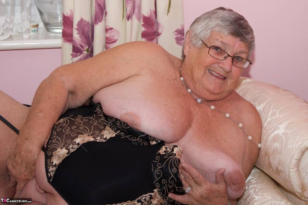 Short haired senior citizen works her tits and pussy free of lingerie - #5